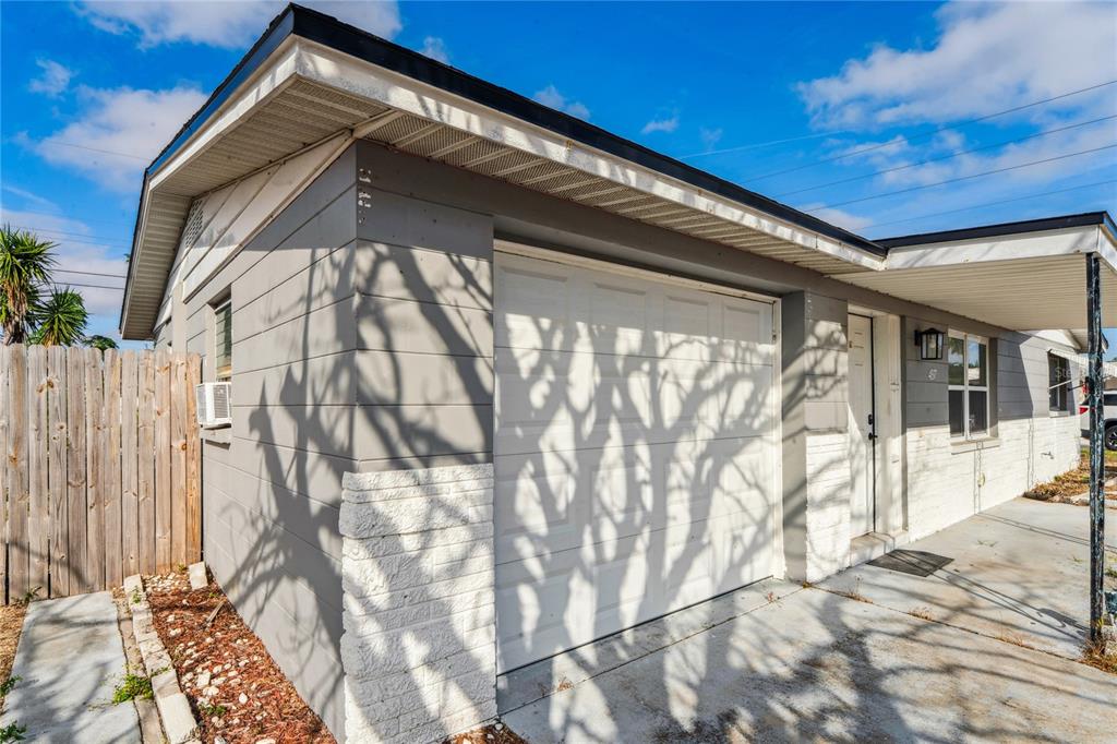 4837 Vision Avenue Holiday, FL 34690 - Photo 35 of 38 a view of house with a outdoor space