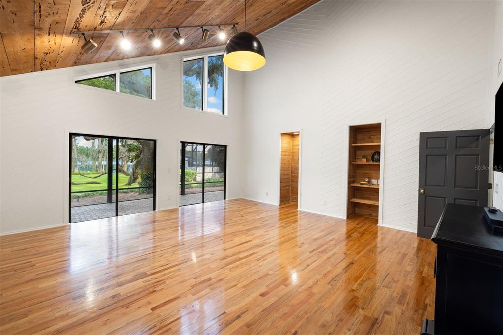9116 Roberts Road Odessa, FL 33556 - Photo 16 of 94 a view of an entryway with wooden floor