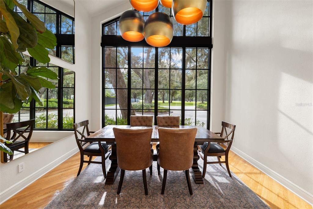 9116 Roberts Road Odessa, FL 33556 - Photo 22 of 94 a view of a dining room with furniture and window