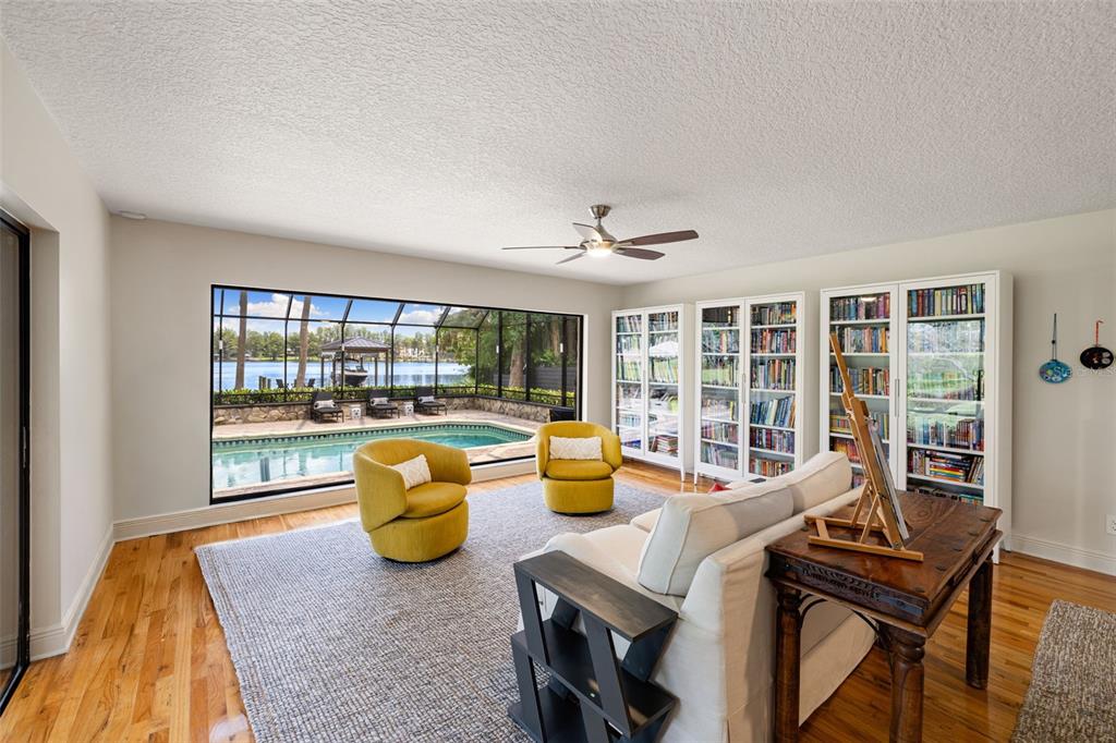9116 Roberts Road Odessa, FL 33556 - Photo 34 of 94 a dining room with furniture and a floor to ceiling window