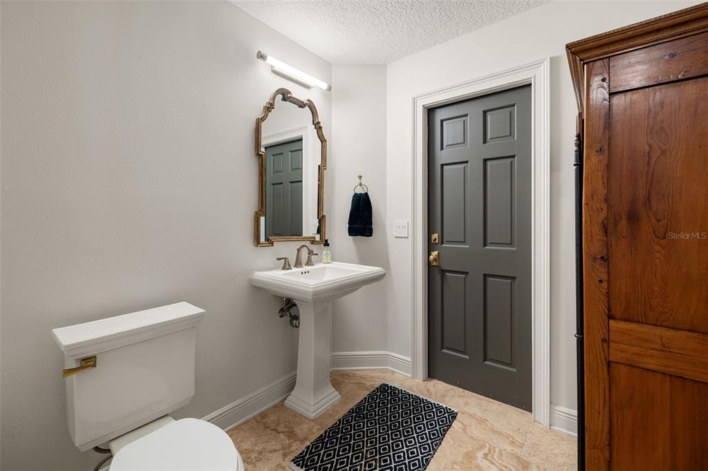 9116 Roberts Road Odessa, FL 33556 - Photo 39 of 94 a bathroom with a sink toilet and shower