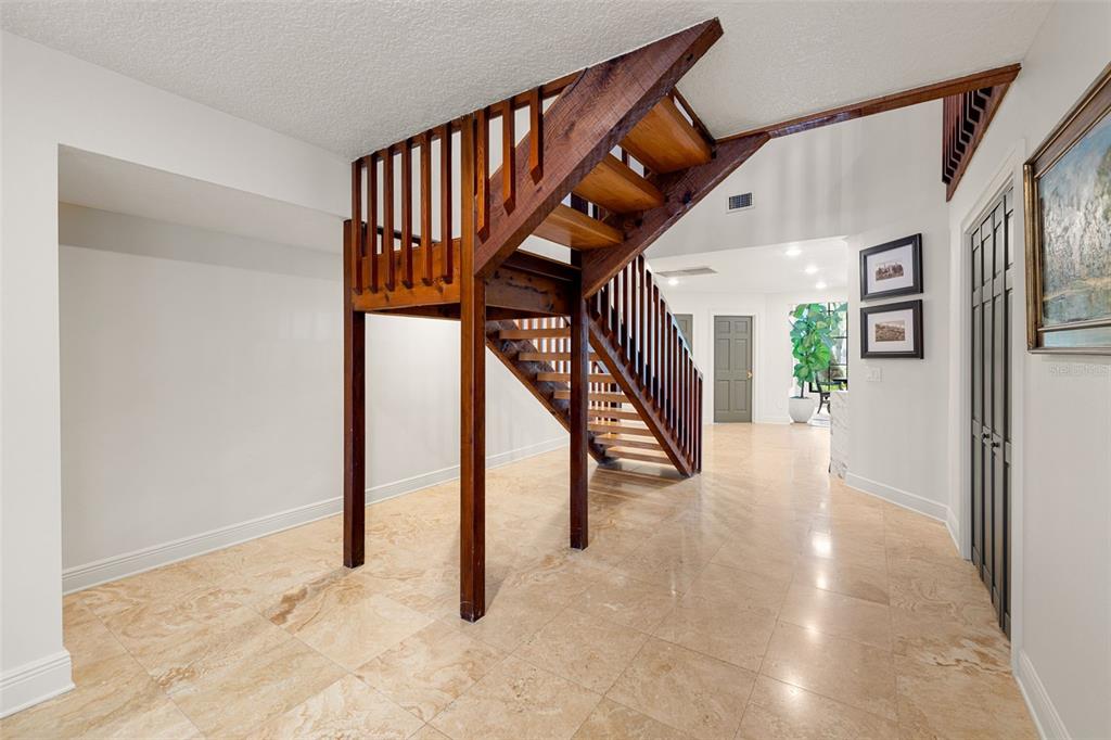 9116 Roberts Road Odessa, FL 33556 - Photo 41 of 94 a view of an entryway with wooden floor