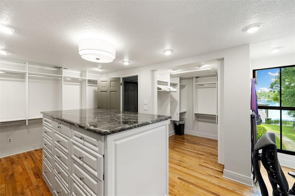9116 Roberts Road Odessa, FL 33556 - Photo 58 of 94 a kitchen with stainless steel appliances granite countertop a sink and a refrigerator