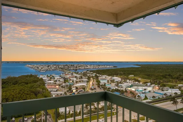 a bathroom with a granite countertop sink mirror and double