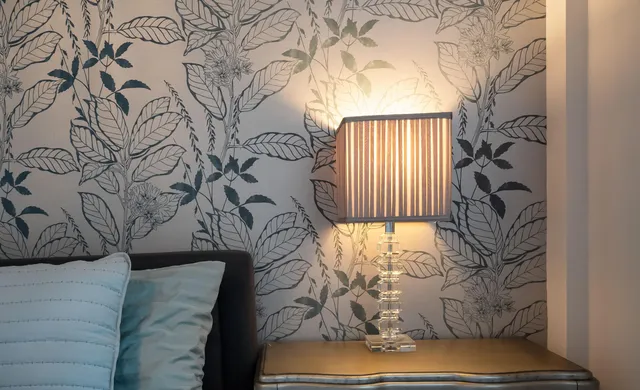 a spacious bathroom with a granite countertop sink mirror and