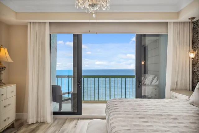 a view of swimming pool with seating space