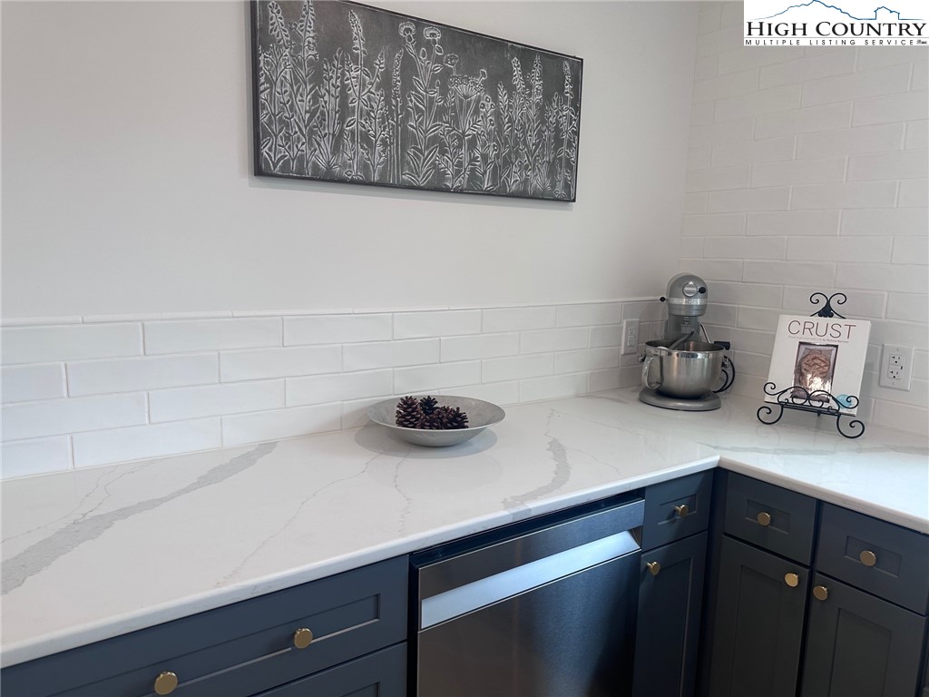 410 Cook Street Jefferson, NC 28640 - Photo 8 of 16 a kitchen with a sink and cabinets