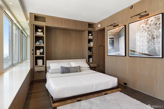 a work room with furniture and windows