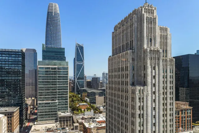 a view of a city with tall buildings