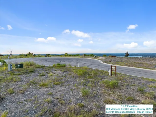 a view of a city with an ocean