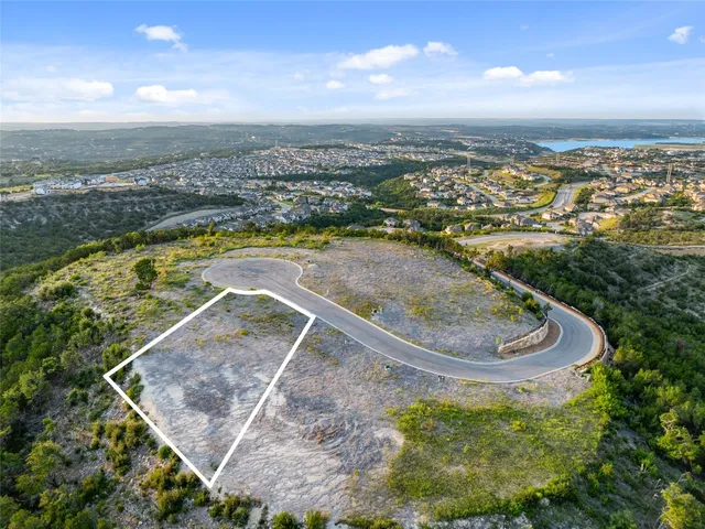 a view of a lake from a balcony