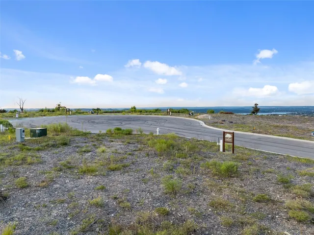 a view of a lake with a city