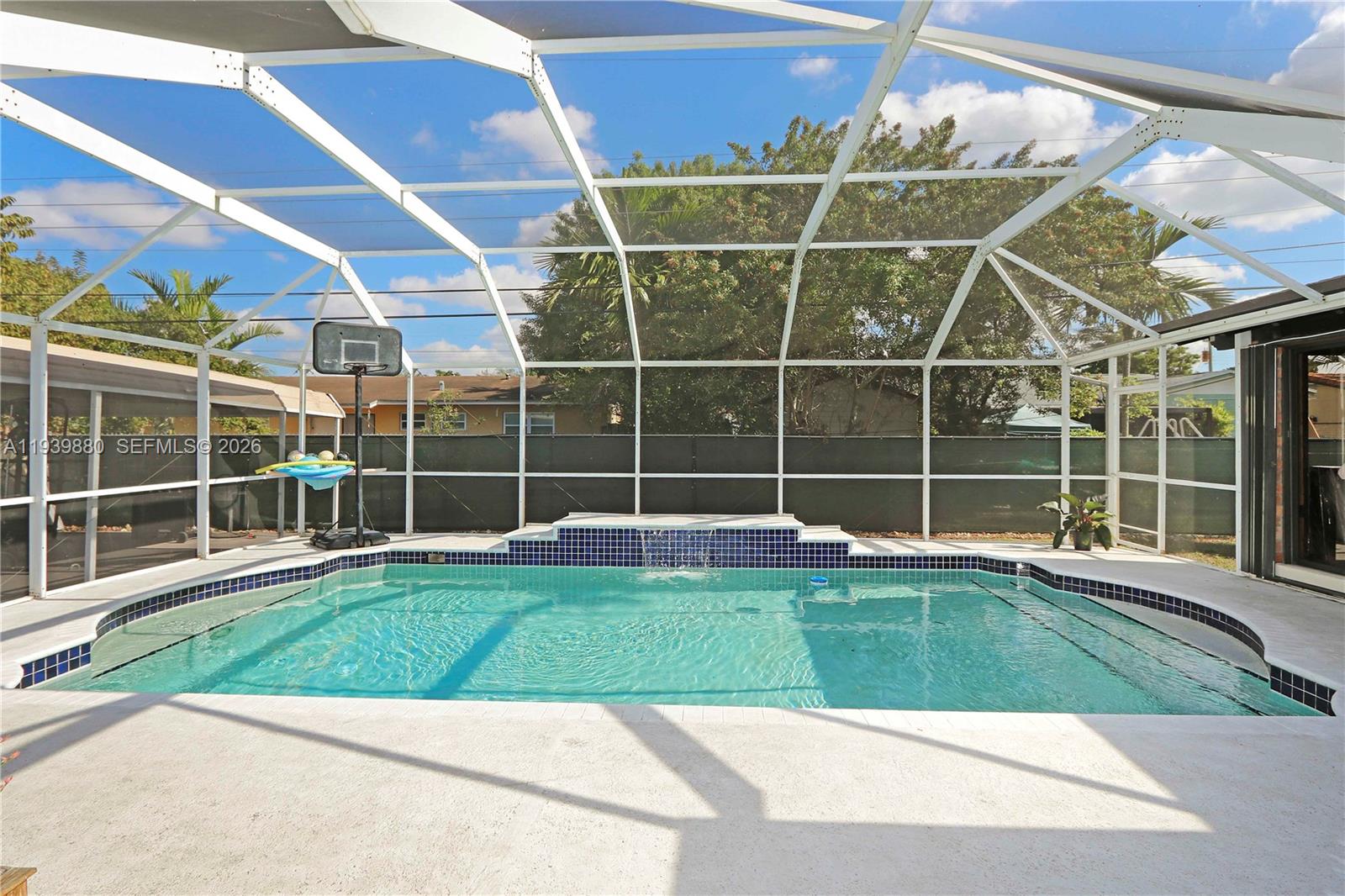 3825 Southwest 125th Avenue Miami, FL 33175 - Photo 10 of 13 a view of a backyard with wooden fence