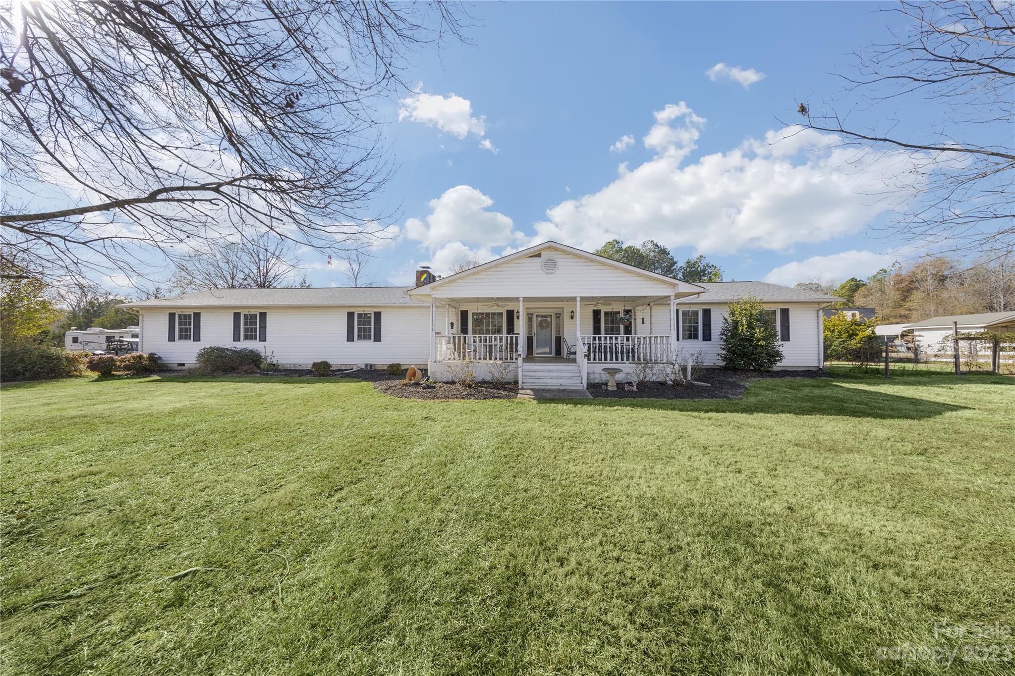 1260 State Rd S-46-536 Rock Hill, SC 29732 - Photo 1 of 34 a front view of a house with a garden
