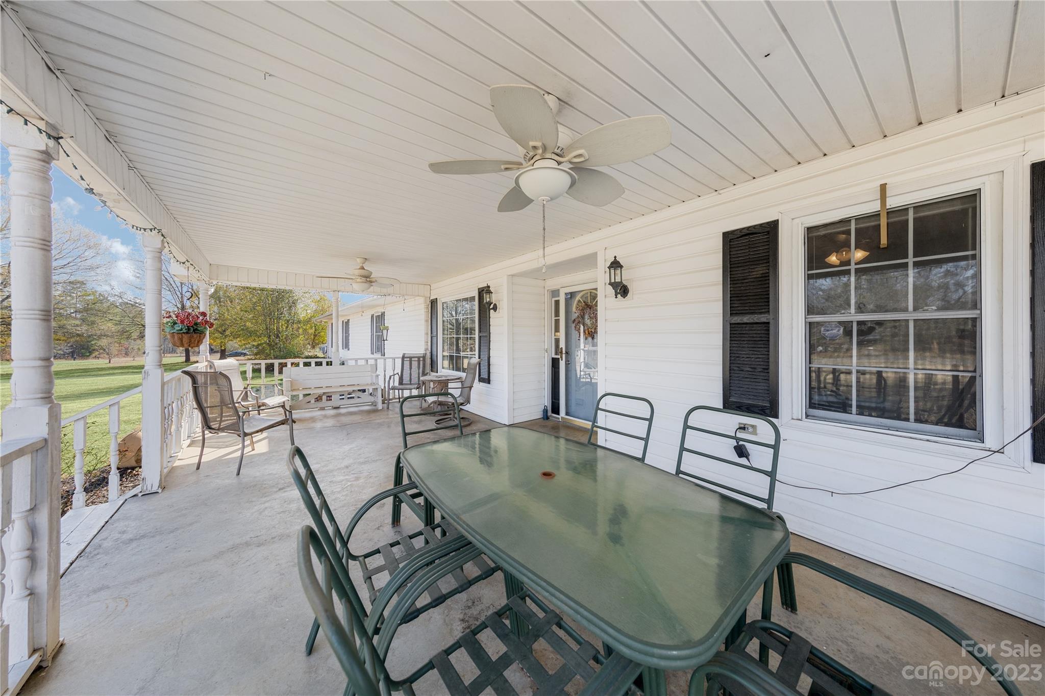 1260 State Rd S-46-536 Rock Hill, SC 29732 - Photo 3 of 34 a dining room with furniture and a floor to ceiling window