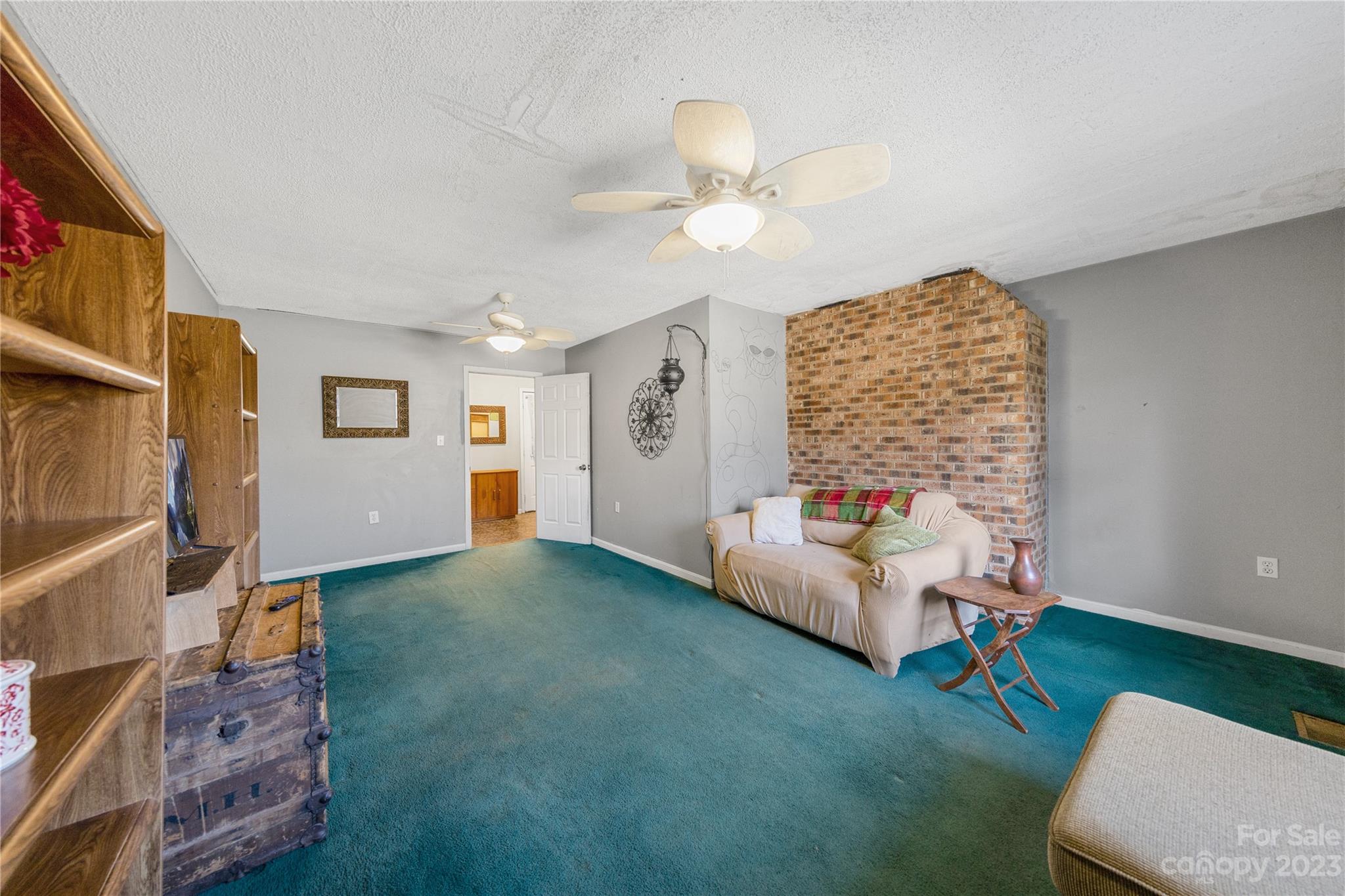 1260 State Rd S-46-536 Rock Hill, SC 29732 - Photo 32 of 34 a living room with furniture and a flat screen tv
