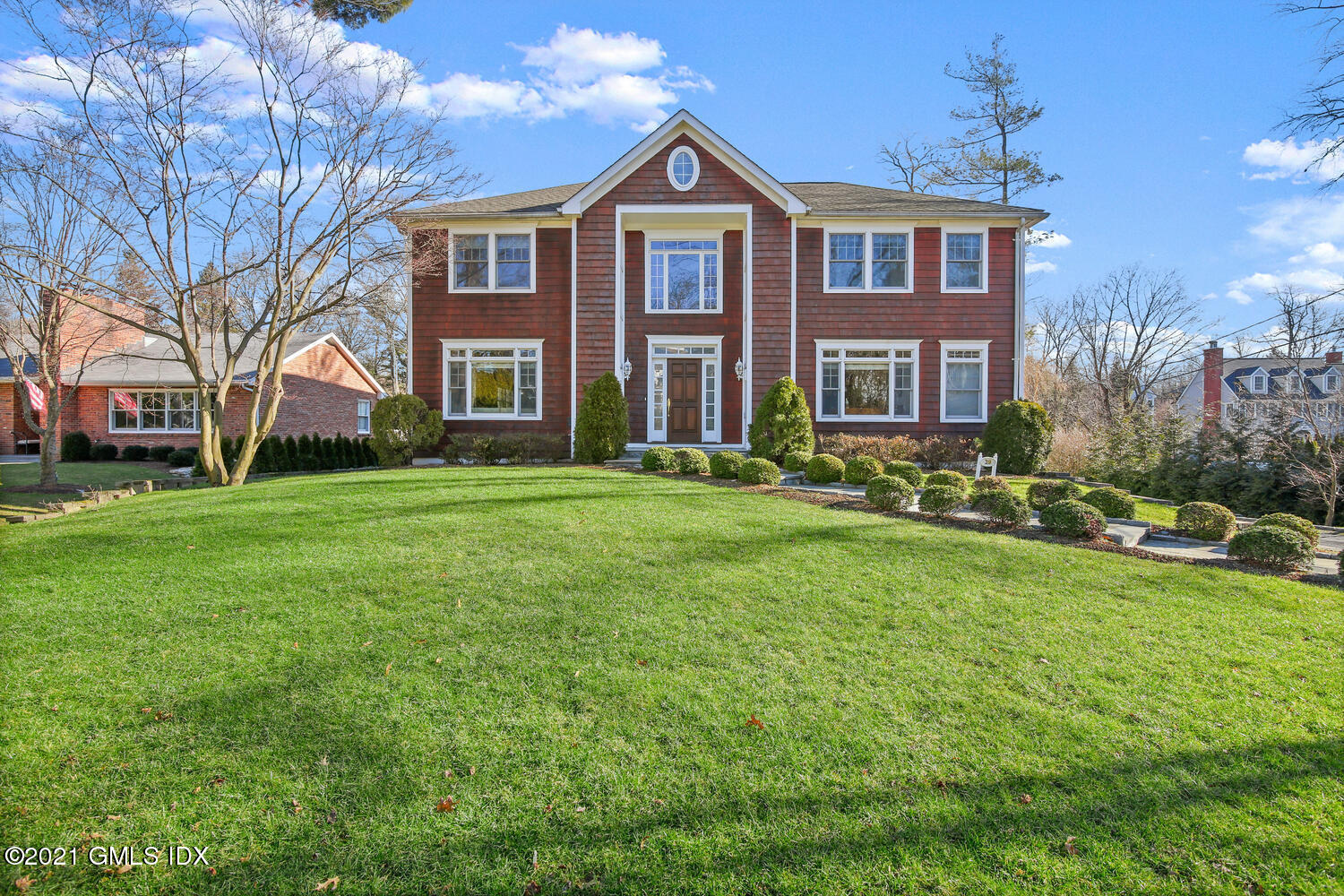 39 Lockwood Lane Riverside, CT 06878 - Photo 1 of 85 a front view of a house with a yard