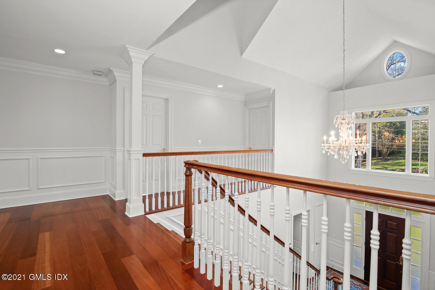 39 Lockwood Lane Riverside, CT 06878 - Photo 41 of 85 a view of a hallway with wooden floor and windows