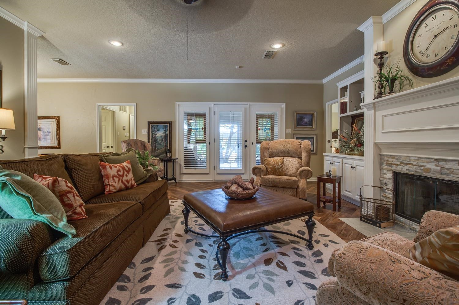 8404 Rochester Avenue Lubbock, TX 79424 - Photo 6 of 10 a living room with furniture a rug and a fireplace