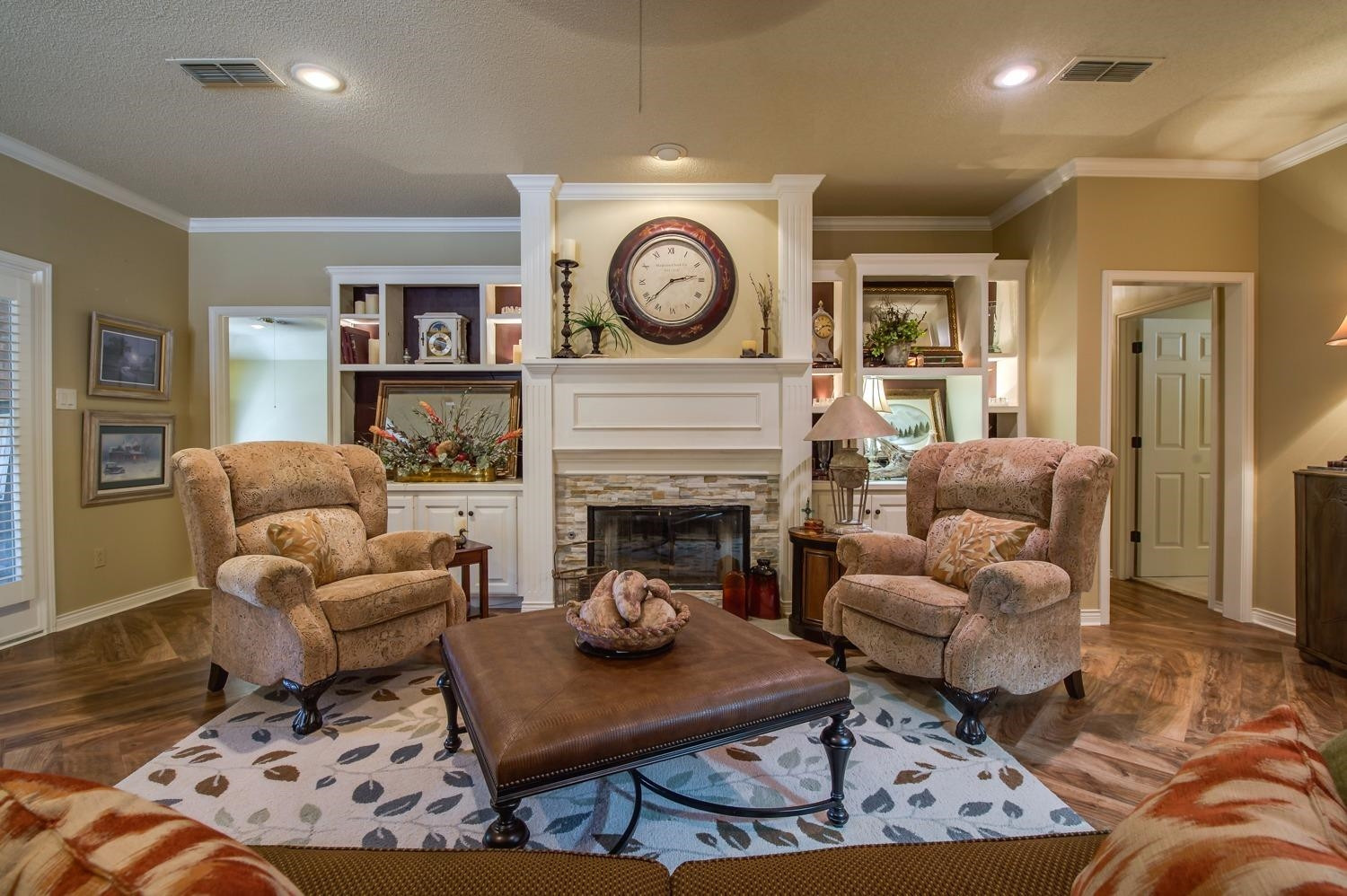 8404 Rochester Avenue Lubbock, TX 79424 - Photo 7 of 10 a living room with furniture a clock and a fireplace
