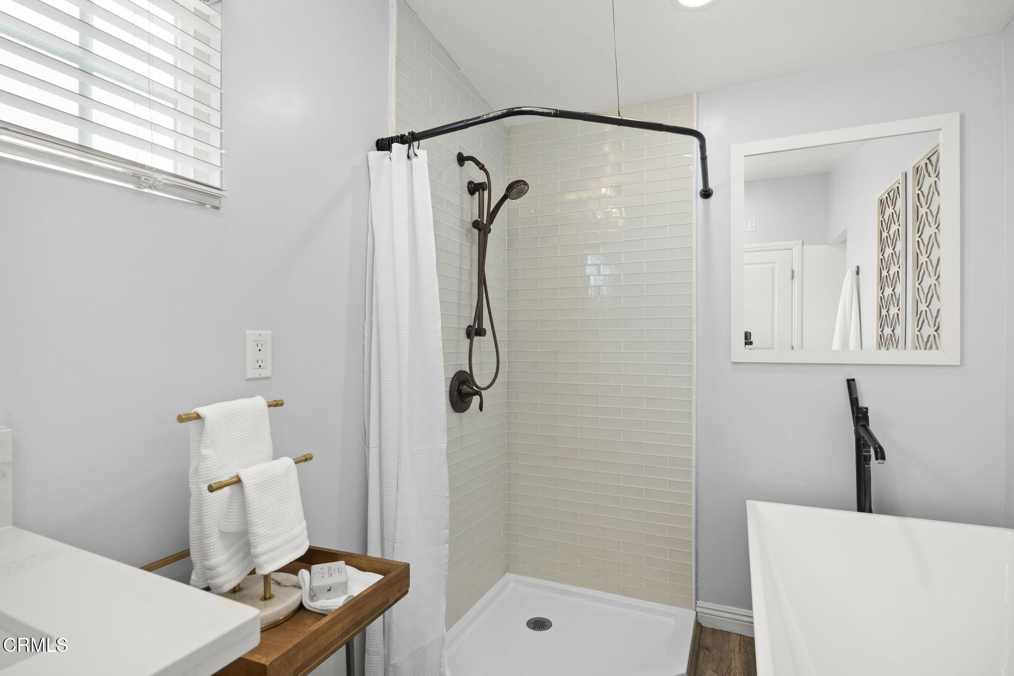2472 Apple Lane, Unit 170 Oxnard, CA 93036 - Photo 19 of 47 a bathroom with a shower and a sink