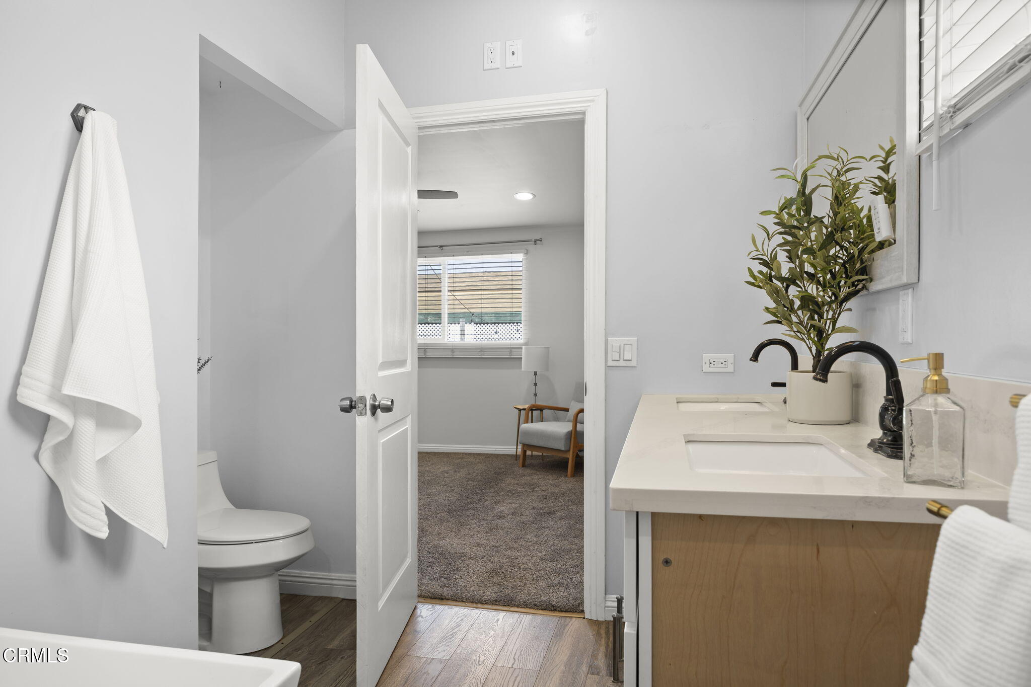 2472 Apple Lane, Unit 170 Oxnard, CA 93036 - Photo 20 of 47 a bathroom with a toilet sink and shower