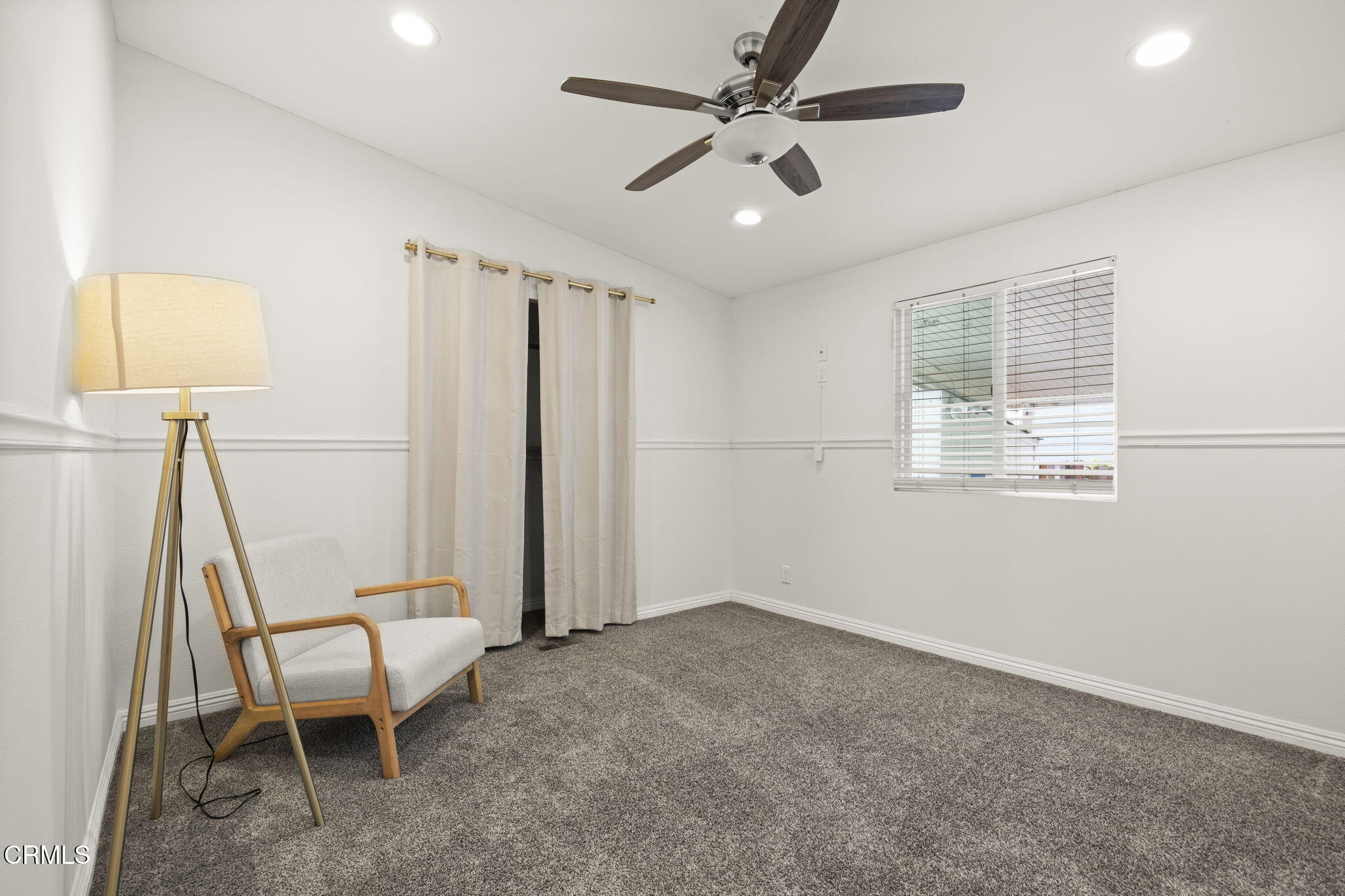 2472 Apple Lane, Unit 170 Oxnard, CA 93036 - Photo 23 of 47 a view of a room with wooden floor and windows