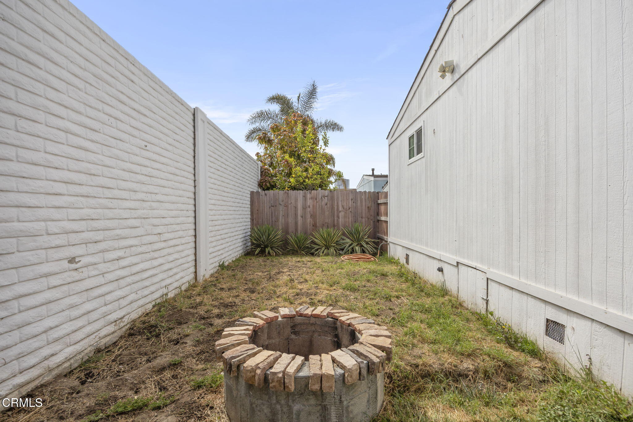 2472 Apple Lane, Unit 170 Oxnard, CA 93036 - Photo 31 of 47 Grassy area and fire pit