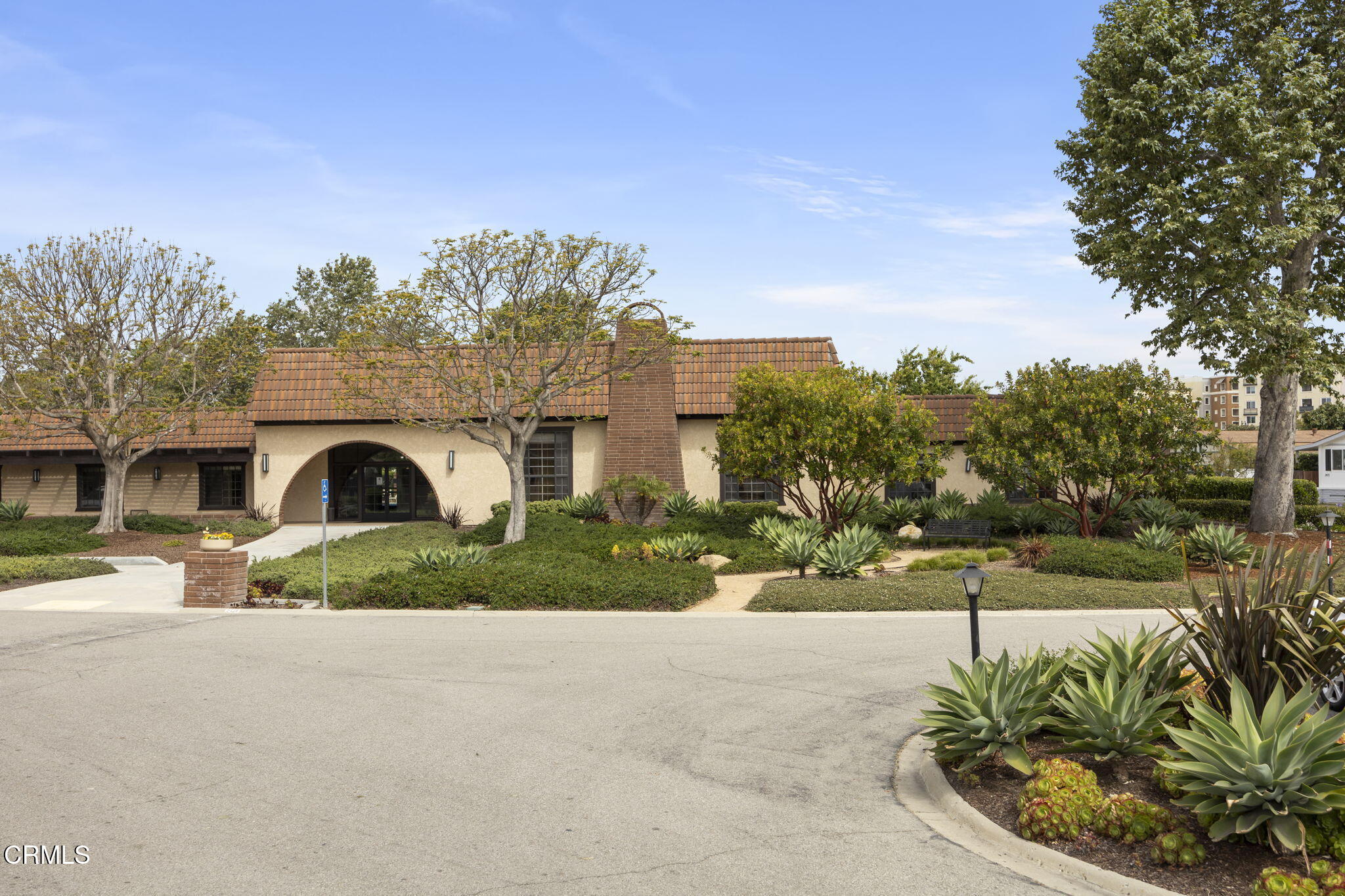 2472 Apple Lane, Unit 170 Oxnard, CA 93036 - Photo 36 of 47 a front view of a house with a yard