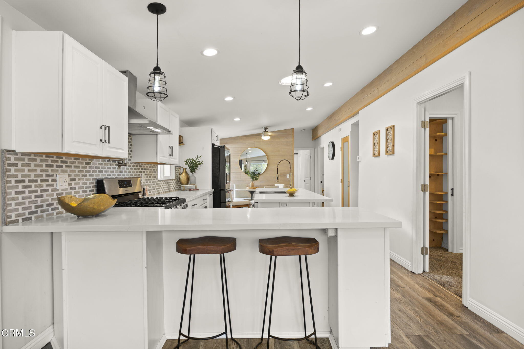 2472 Apple Lane, Unit 170 Oxnard, CA 93036 - Photo 8 of 47 a kitchen with kitchen island a counter top space appliances and cabinets