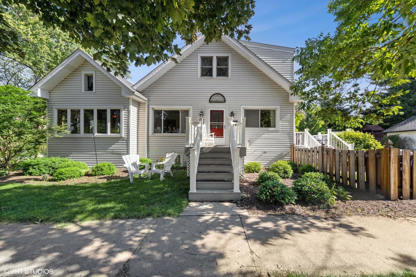 401 Lyon Avenue Wheaton, IL 60187 - Photo 1 of 34 a front view of a house with garden