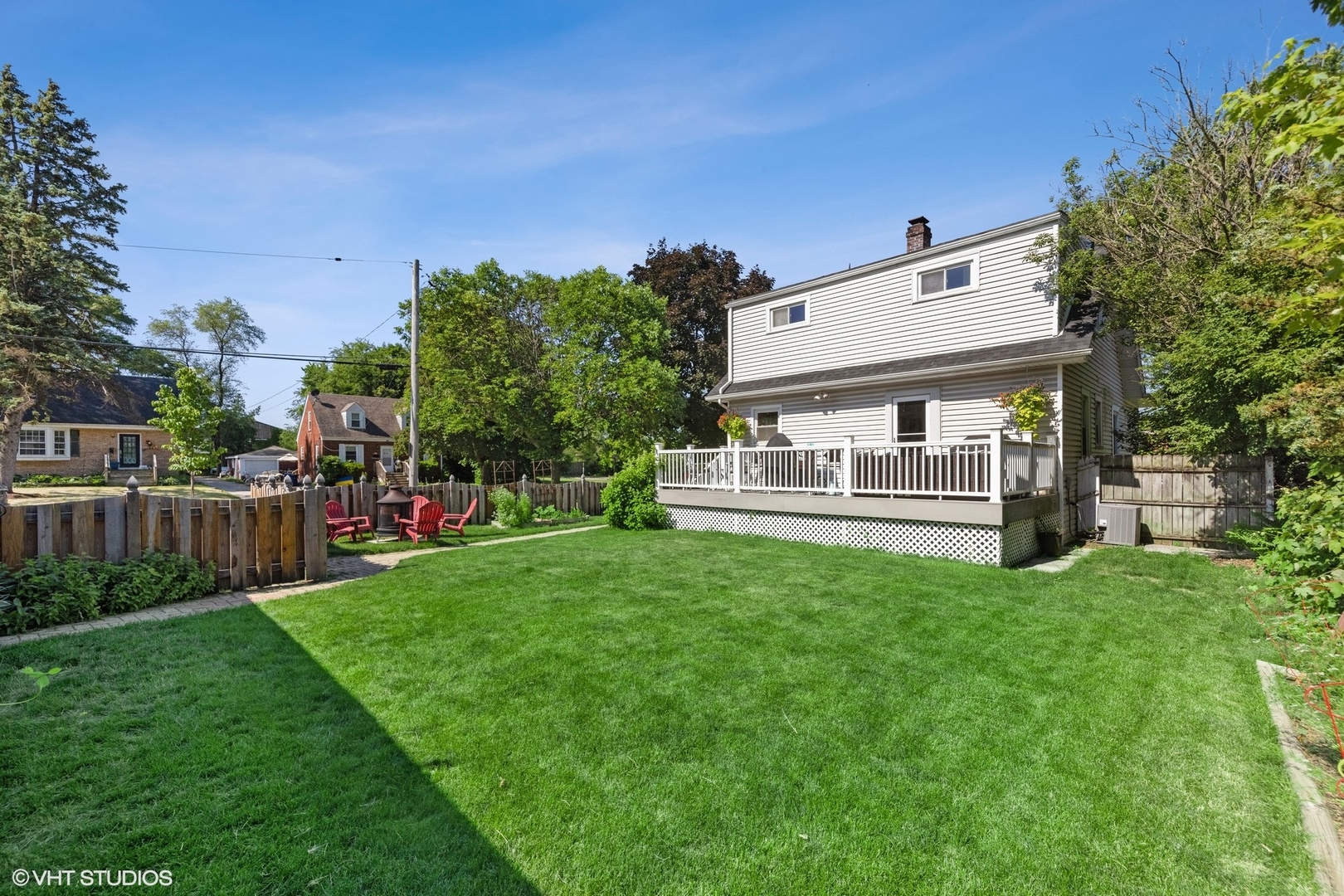 401 Lyon Avenue Wheaton, IL 60187 - Photo 25 of 34 a view of house with backyard and a garden