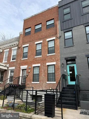 a front view of a building with glass windows