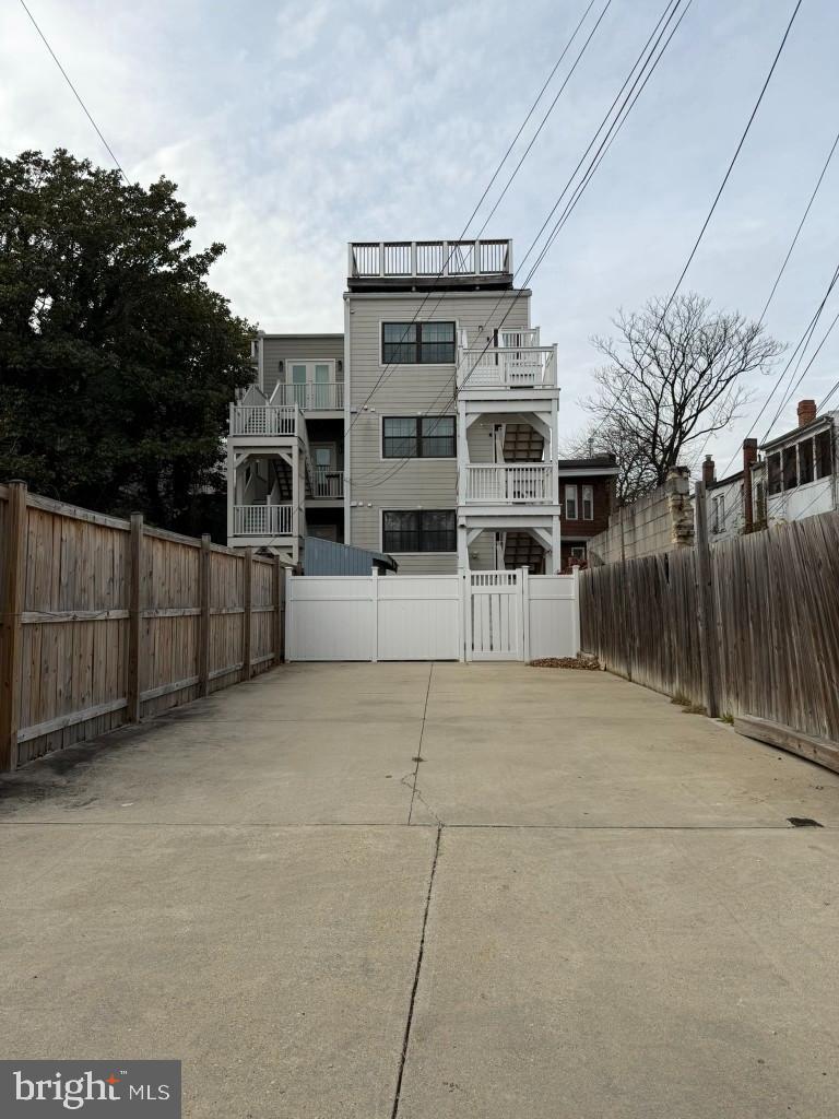 3223 Warder Street Northwest, Unit 2 Washington, DC 20010 - Photo 5 of 5 a view of a house with a yard