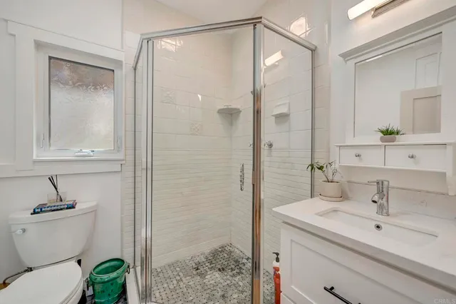 a view of a house with swimming pool and sitting area