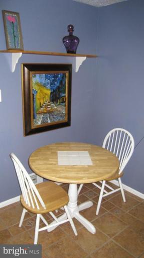 8532 Riverside Road Alexandria, VA 22308 - Photo 20 of 22 a view of a dining room with furniture