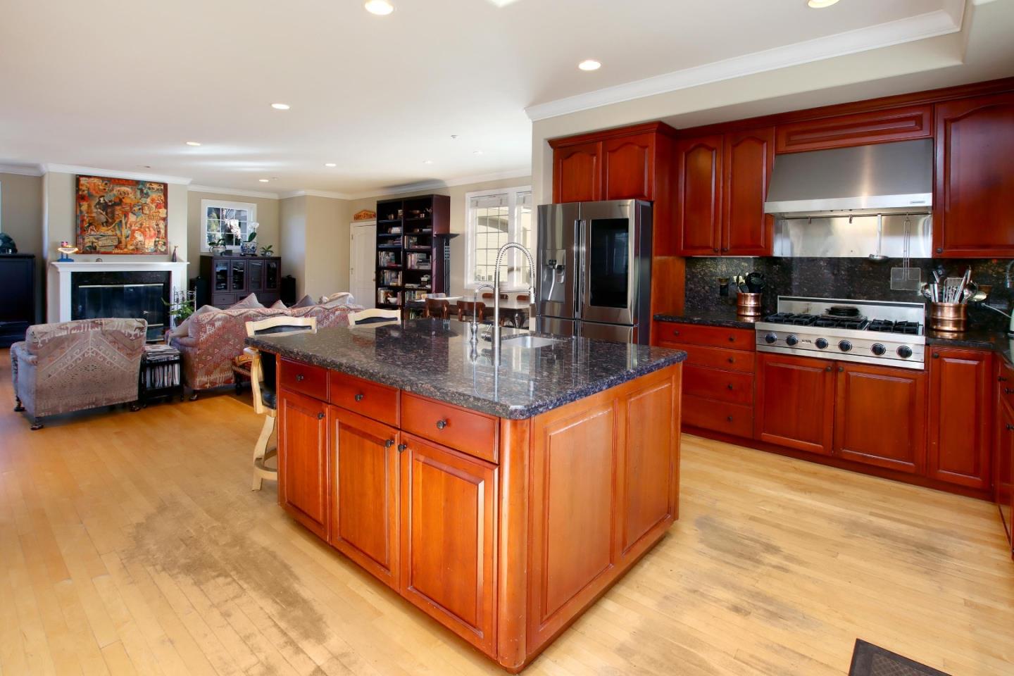 344 Los Robles Road Soquel, CA 95073 - Photo 21 of 76 a large kitchen with stainless steel appliances granite countertop a stove refrigerator and cabinets