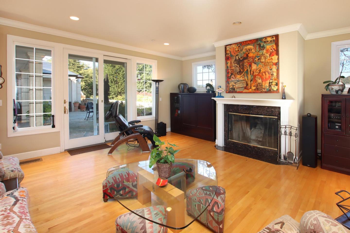 344 Los Robles Road Soquel, CA 95073 - Photo 26 of 76 a living room with furniture a flat screen tv and a fireplace