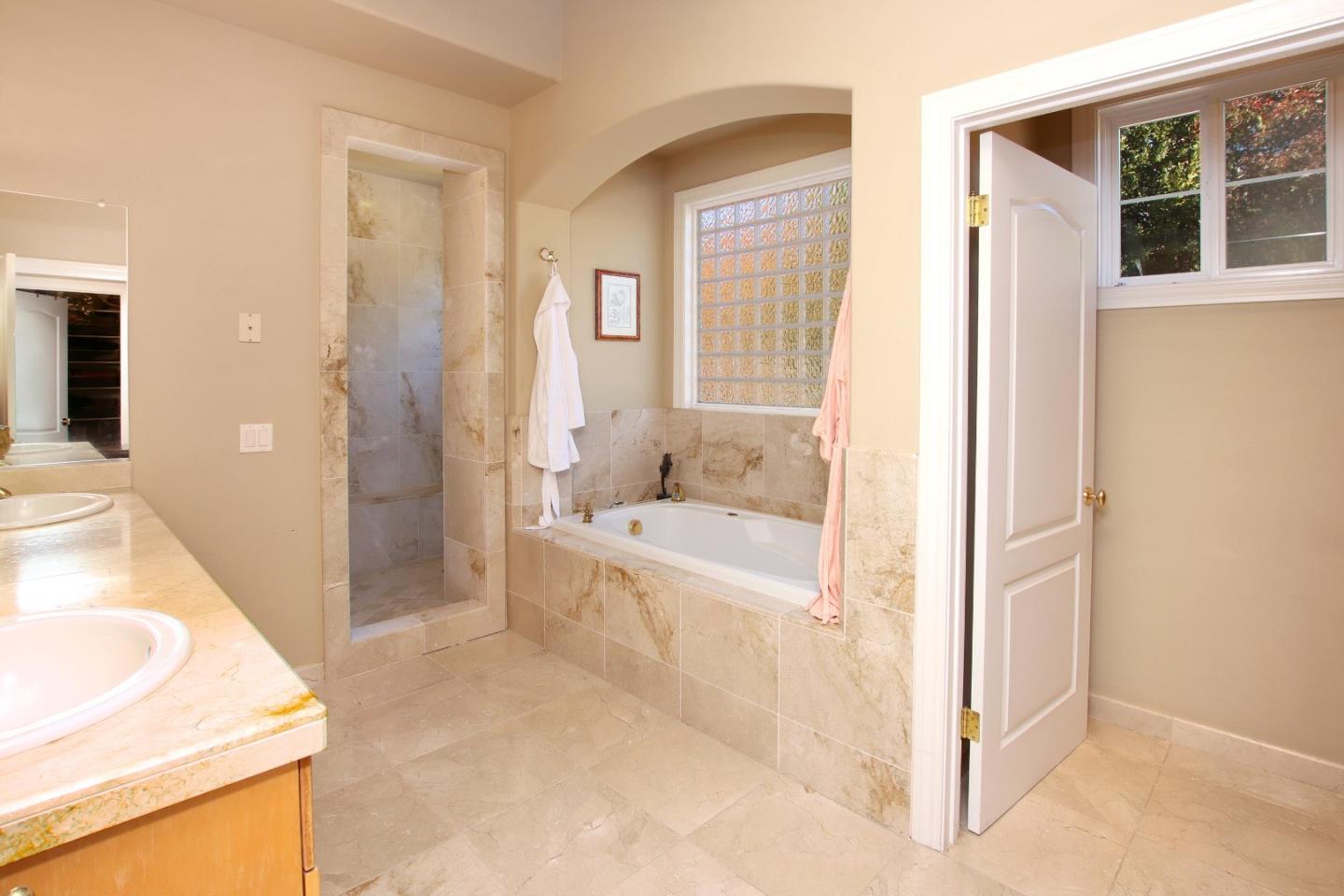344 Los Robles Road Soquel, CA 95073 - Photo 35 of 76 a bathroom with a tub shower and sink