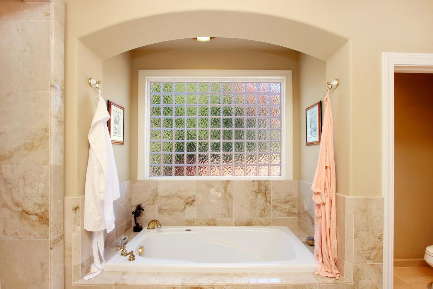 344 Los Robles Road Soquel, CA 95073 - Photo 36 of 76 a bath tub sitting next to a window