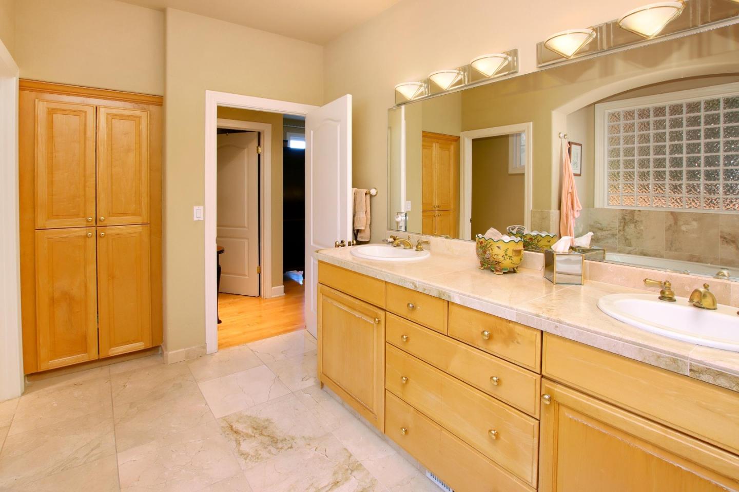 344 Los Robles Road Soquel, CA 95073 - Photo 37 of 76 a spacious bathroom with sinks mirror and vanity