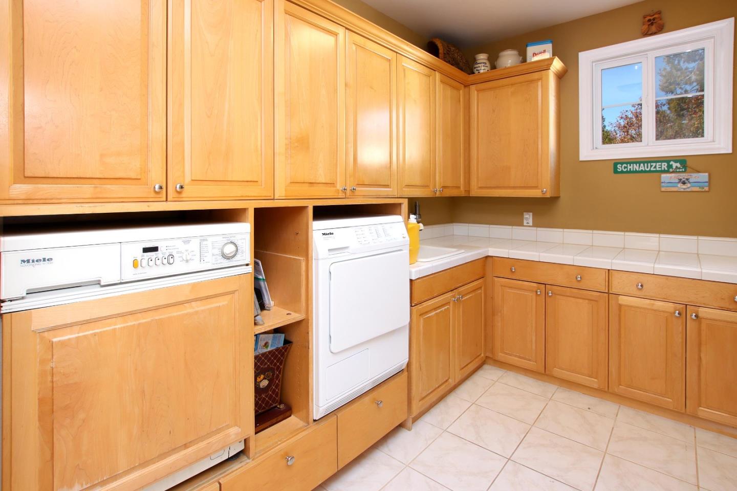 344 Los Robles Road Soquel, CA 95073 - Photo 44 of 76 a utility room with dryer and washer