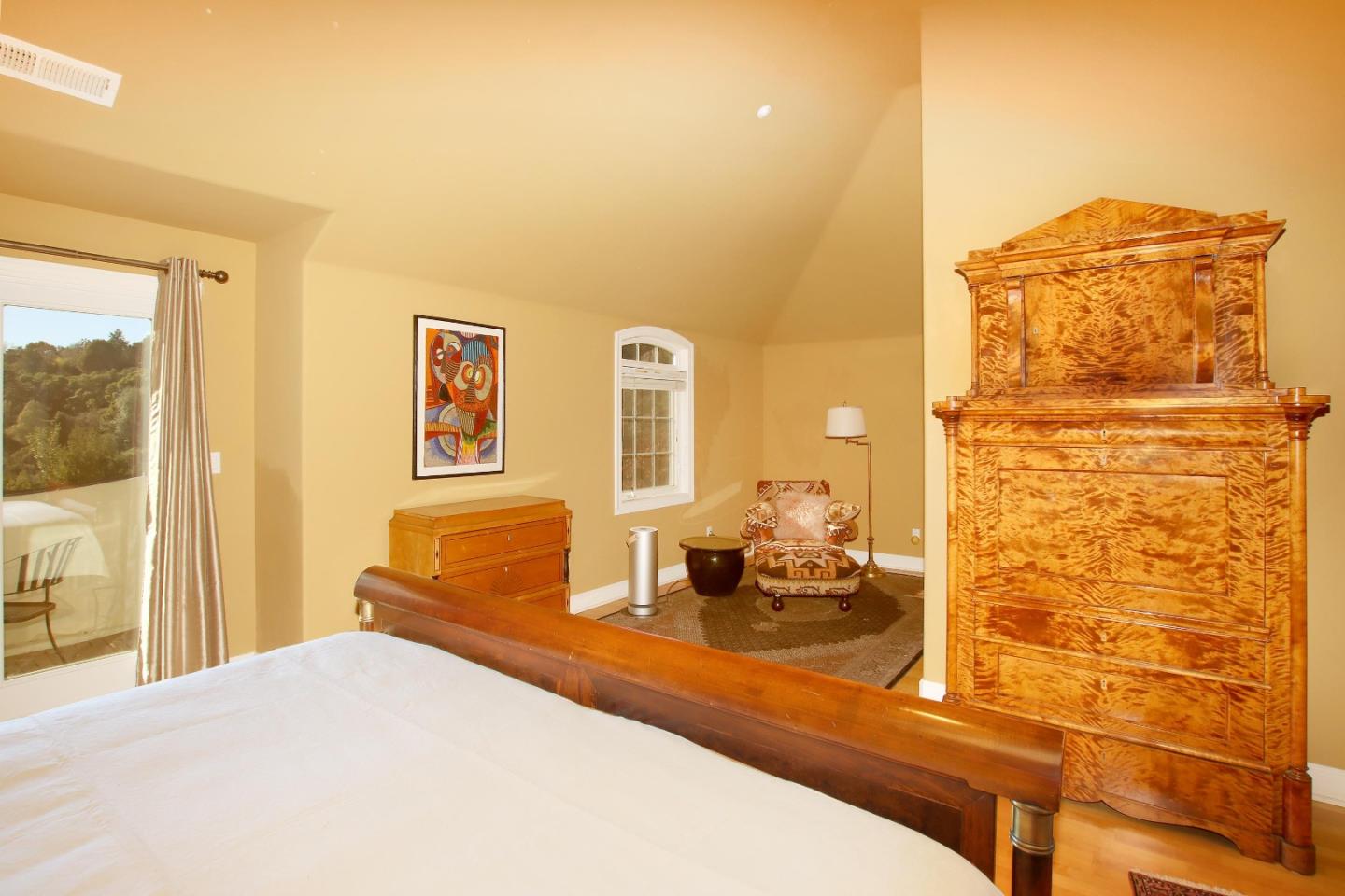 344 Los Robles Road Soquel, CA 95073 - Photo 51 of 76 a bedroom with a bed and wooden floor