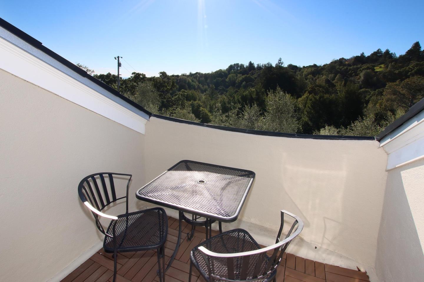344 Los Robles Road Soquel, CA 95073 - Photo 52 of 76 a view of a chair and table in the balcony