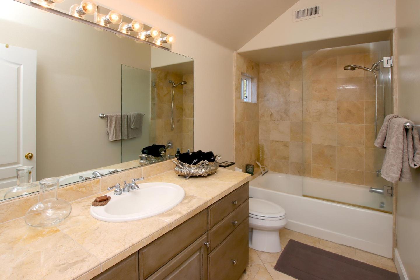344 Los Robles Road Soquel, CA 95073 - Photo 54 of 76 a bathroom with a sink a toilet and shower