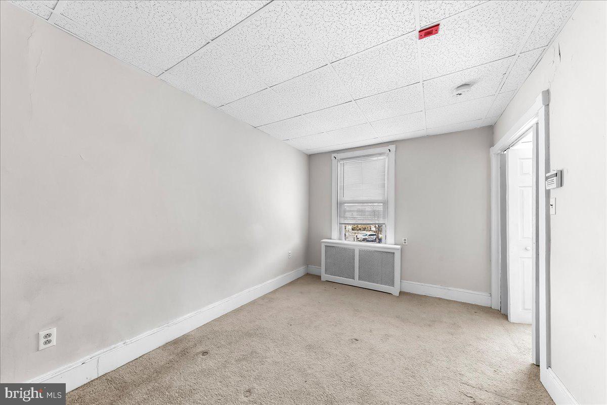 13 South Chester Road Swarthmore, PA 19081 - Photo 30 of 48 a view of an empty room with a window