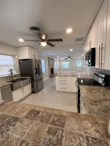 a view of kitchen and kitchen island