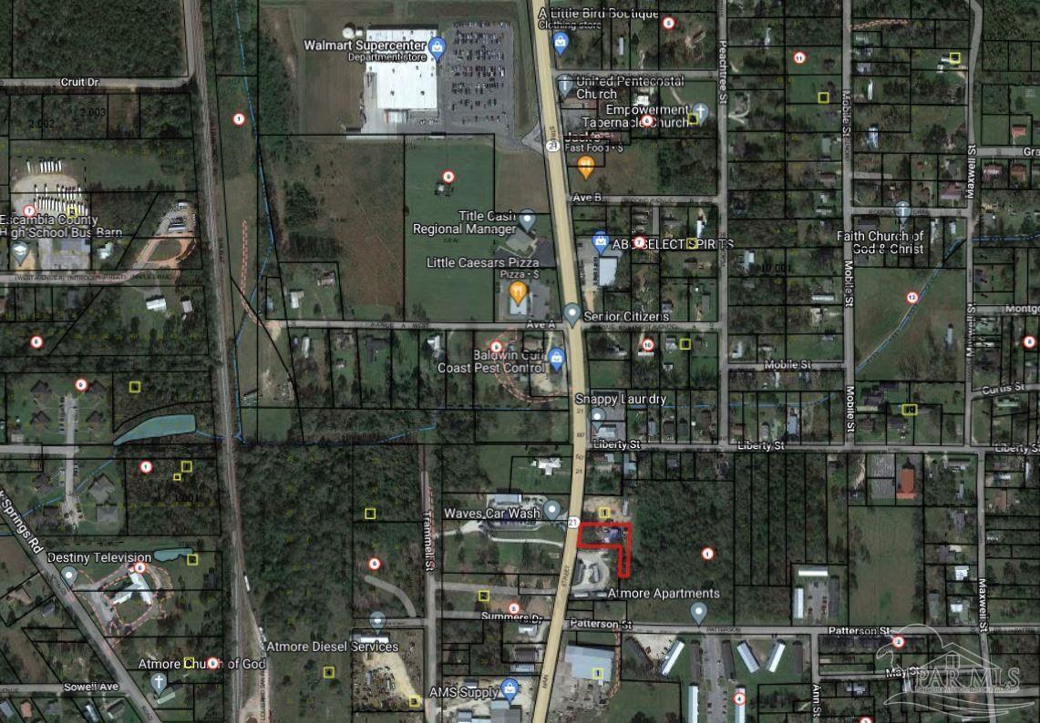 612 North Main Street Atmore, AL 36502 - Photo 12 of 12 a bathroom with a glass shower door