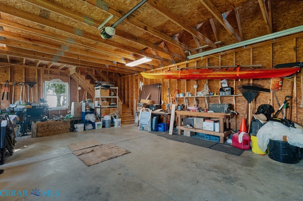 24 River Road Lottsburg, VA 22511 - Photo 5 of 35 a view of a storage room with a lot of stuff