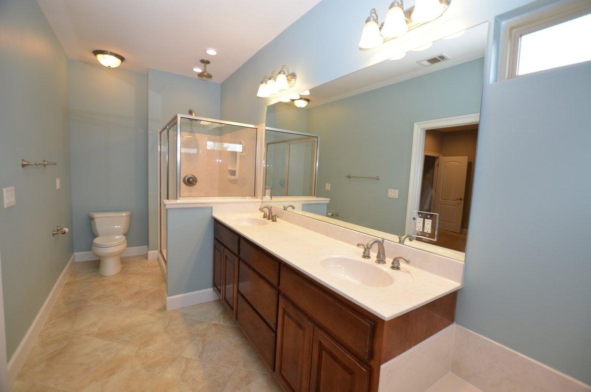 5952 Old Bethel Road Crestview, FL 32536 - Photo 12 of 25 a bathroom with a sink double vanity and a mirror